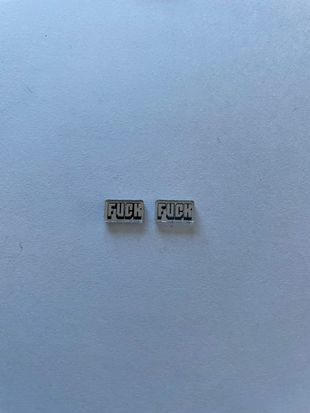 Tiniest F*CK shaped tag